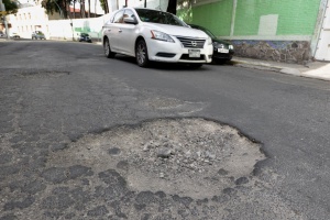 Será necesario tomar fotos del bache y del daño ocasionado Será necesario tomar fotos del bache y del daño ocasionado